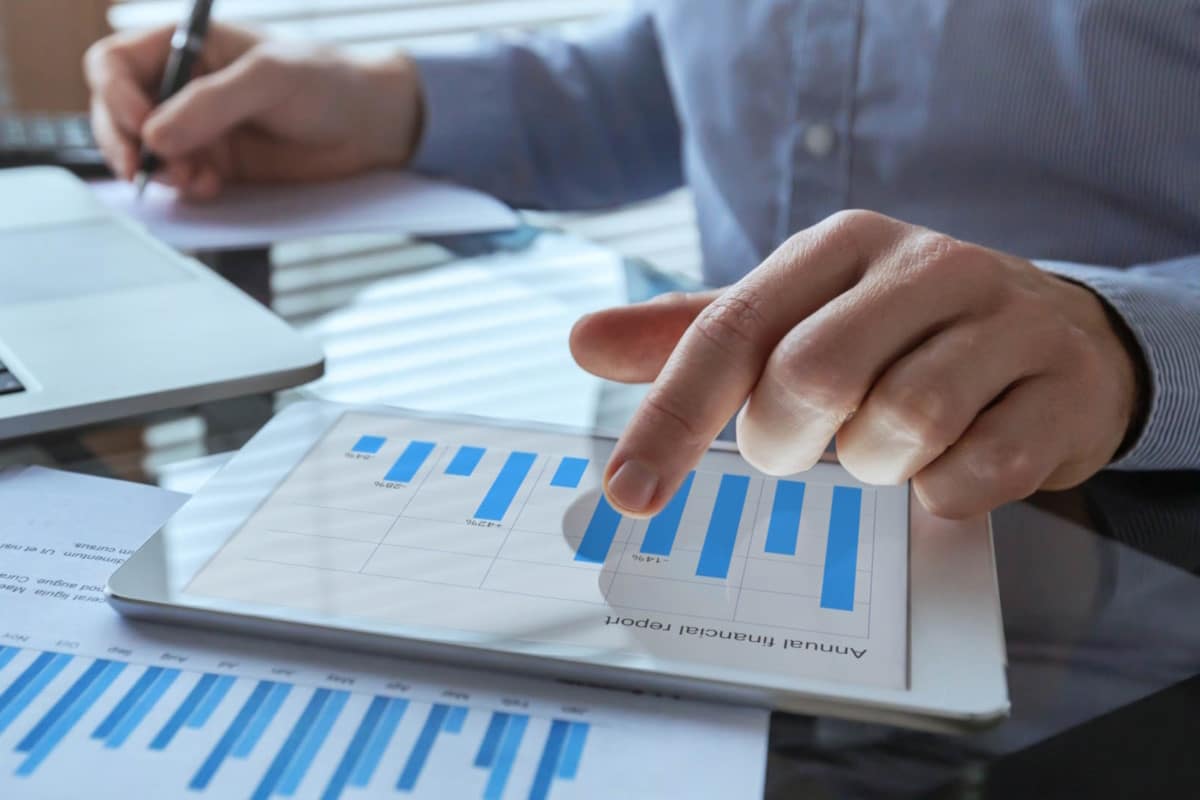 marketing collateral sales growth businessman with financial charts