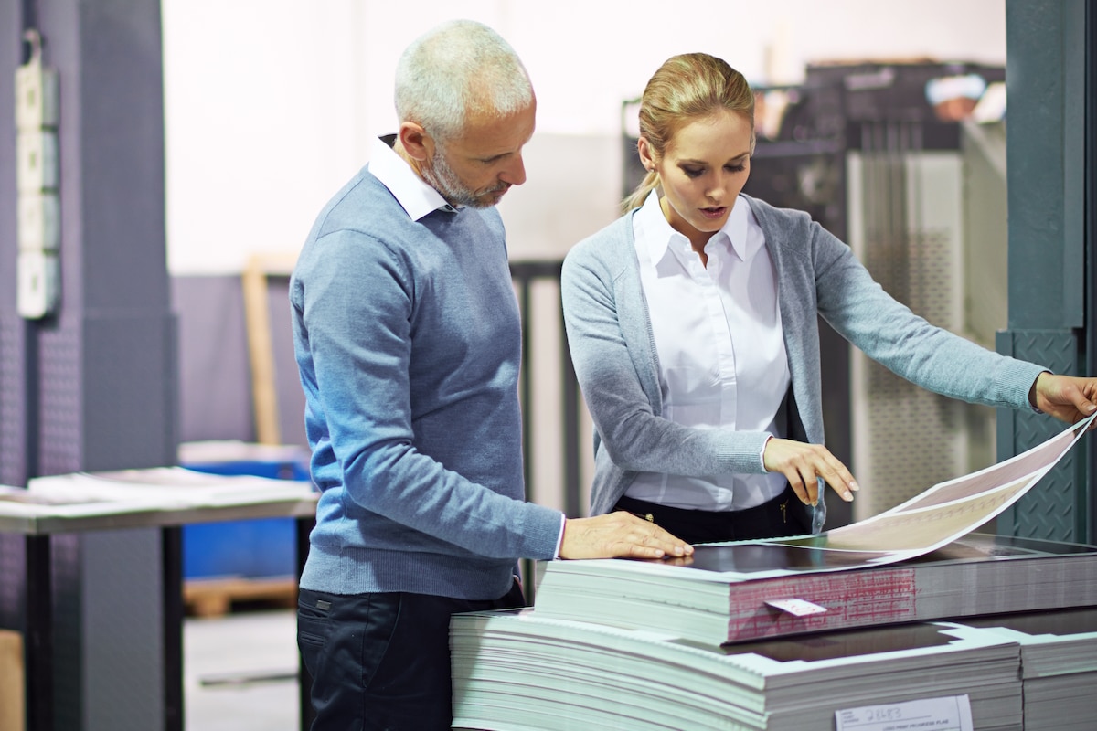 rebrand marketing collateral checking print quality